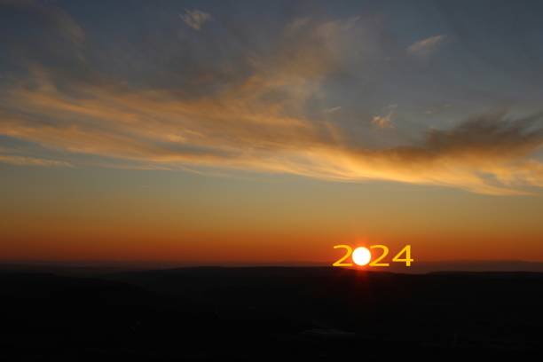 istock Transition from 2023 to new year 2024 concept with text on sun rising sky. Creative Concept. 1770696209
