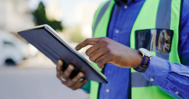 istock Hands, tablet and person in construction or architect working on floor plan, inspection and maintenance job. Check digital blueprint for architecture project, design software and quality assurance 1770706186