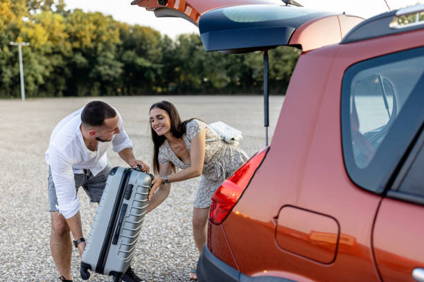 istock Young duo brings suitcases, embarking on a shared adventure 1770717710