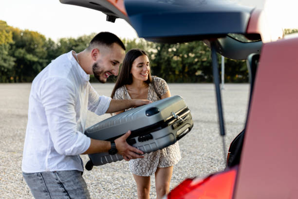 istock Young couple prepares for a romantic escape 1770723745