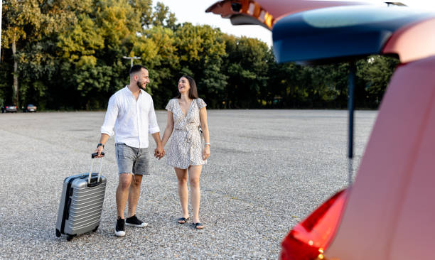 istock Young couple loads suitcases, driven by wanderlust 1770725435