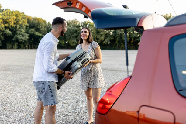 istock Young couple packs suitcases, ready to explore 1770730496