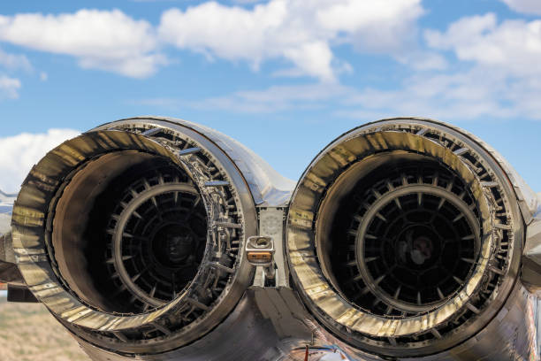 istock Close up of two jet engines under cloudy skies 1770740521