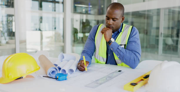 istock Black man, architect and thinking while drawing blueprint for construction job, engineering and design with developer. Contractor, ideas and architecture project with floor plan and productivity 1770745106