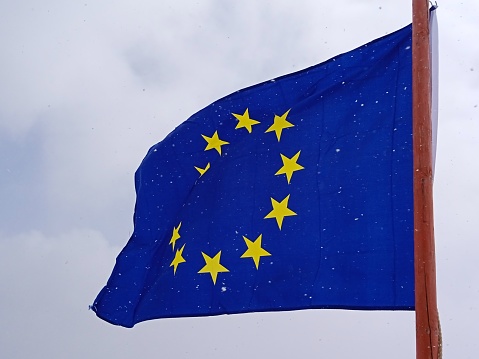 European Union flag, blue flag with yellow stars representing the EU