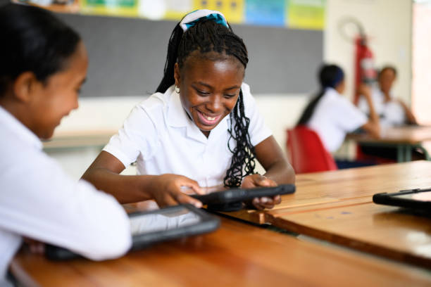 istock Multiracial schoolgirls using digital tablet in mathematics class 1770759045