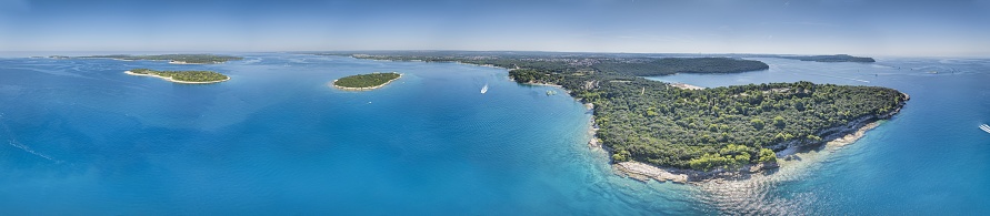 Drone panorama over Brijuni islands in front of Pula in Istria during daytime in summer