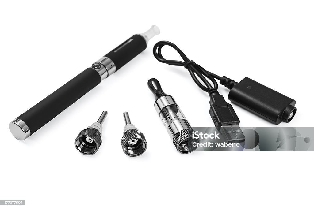 Electronic cigarette -healthy smoking Electronic cigarette on white background Battery Charger Stock Photo