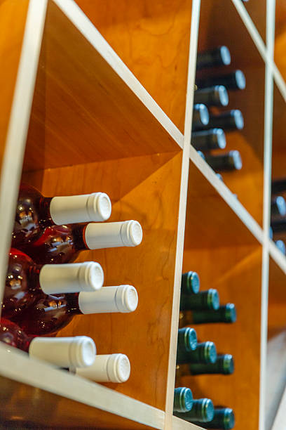 istock Wine bottles stacked in shelfs 177078921