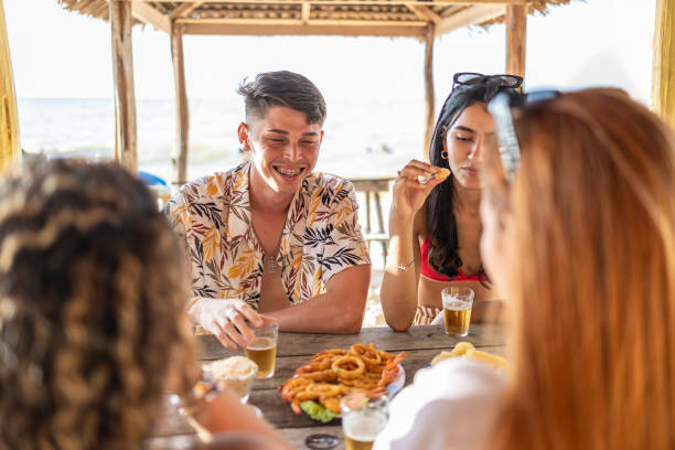 istock Friends eating at a beach kiosk 1770798989
