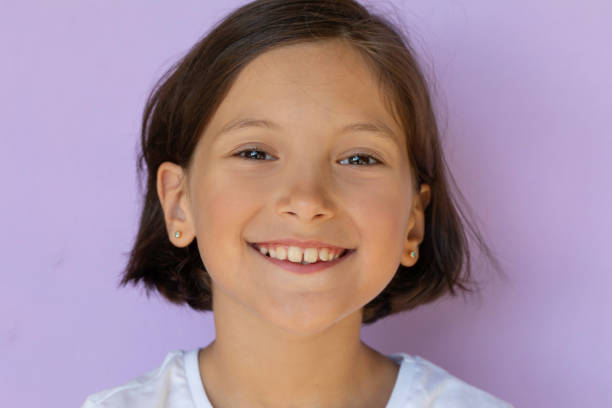 Close-up portrait of girl smiling.