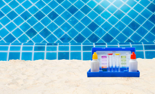 istock Water tester on sandy beach over clear swimming pool water 1770811566