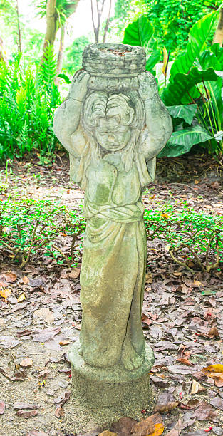 istock old white statue girl prayer 177083188