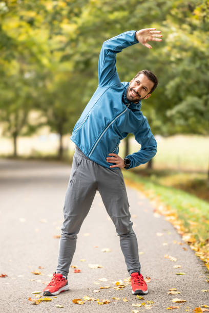 istock A young athlete is warming up before running training in the park. 1770832281