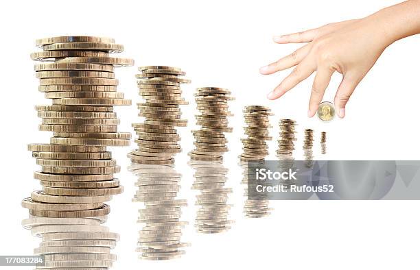Stacks Of Thai Coins With Hand White Background Stock Photo - Download Image Now - Adult, Backgrounds, Banking