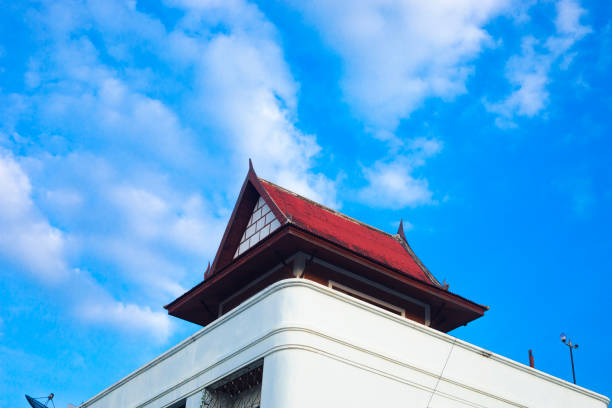 Small traditional room with thai rooftop on top of condominium in residential district of Bangkok Chatuchak. Condomonium is older one