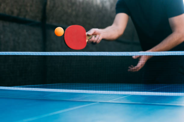 istock View of a young man playing table tennis. 1770845945