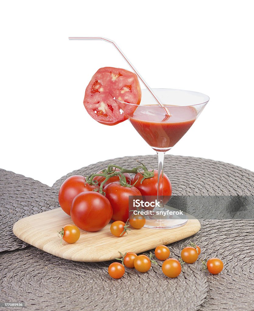 Jugo de tomate en el vaso. - Foto de stock de Alimento libre de derechos