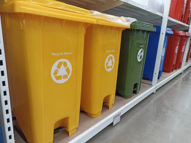 istock Trash cans of various colors separate types of garbage. 1770861067