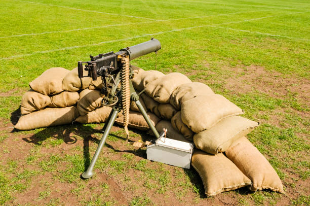 Vickers water cooled medium machine gun surrounded with sandbags, as used in World War 1.