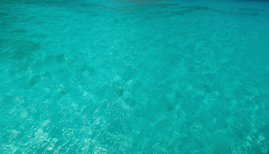 Turquoise clear sea water. Background.