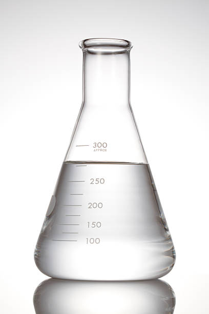 Erlenmeyer flask with clear liquid lab Flask on white background laboratory glassware stock pictures, royalty-free photos & images
