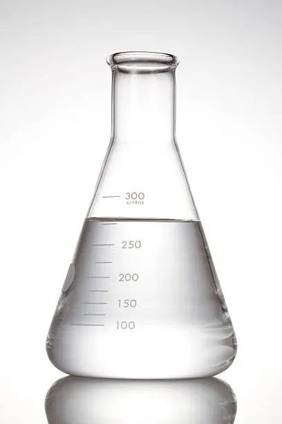 Photo of Erlenmeyer flask with clear liquid