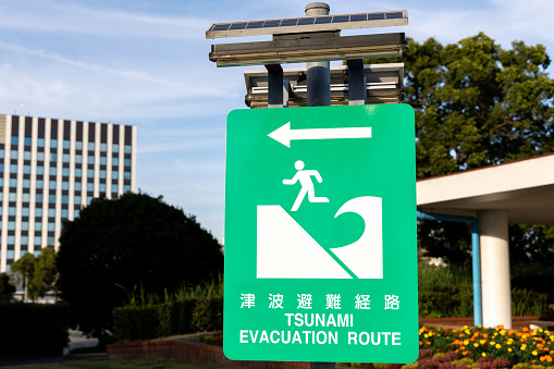 Emergency sign: Tsunami Evacuation Route sign in Japan.