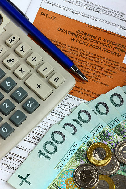 istock Tax form with calculator, money and pen 177087911