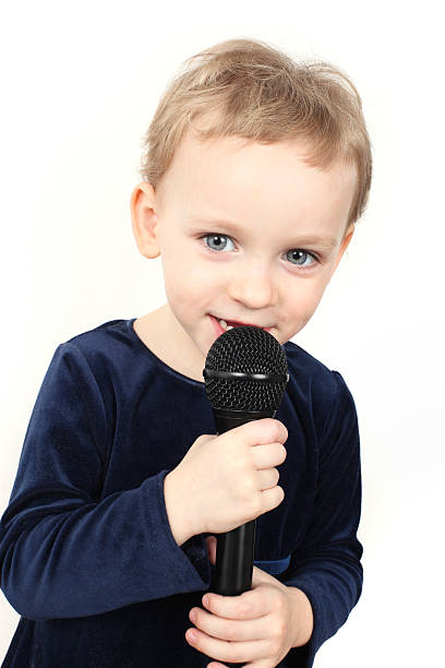 istock Cute little girl is singing 177088667