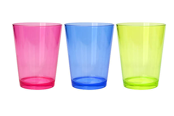 Colorful Empty Plastic Cups Colorful Empty Plastic Cups on White Background translucent stock pictures, royalty-free photos & images