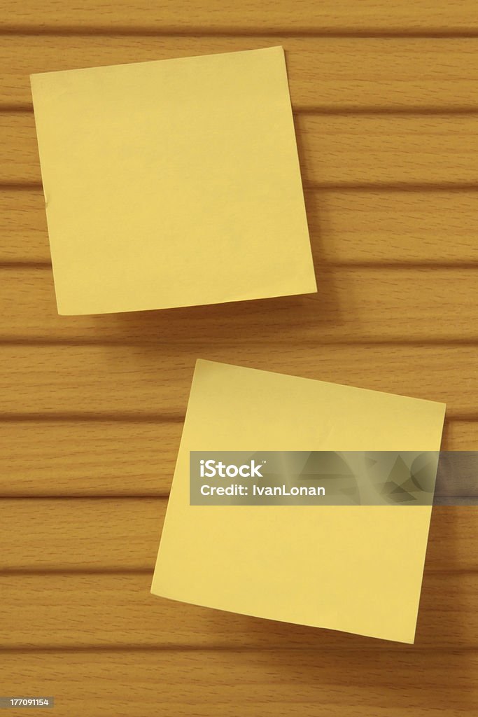 two notes two notes stick on the wood cabinet Adhesive Note Stock Photo