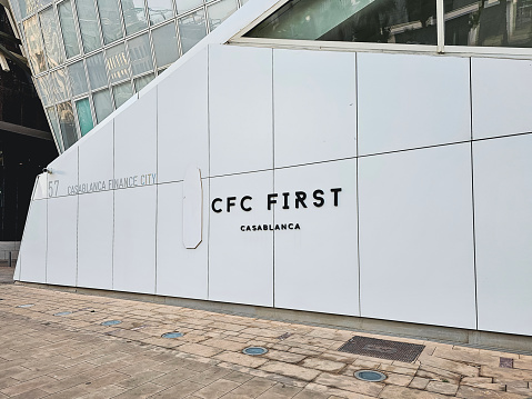 Casablanca, Morocco - November 2, 2023 : CFC FIRST Casablanca Logo on wall, CFC FIRST Tower is a landmark in the new Casa-Anfa zone and is recognized by its elegance, unique technique and ecological performance