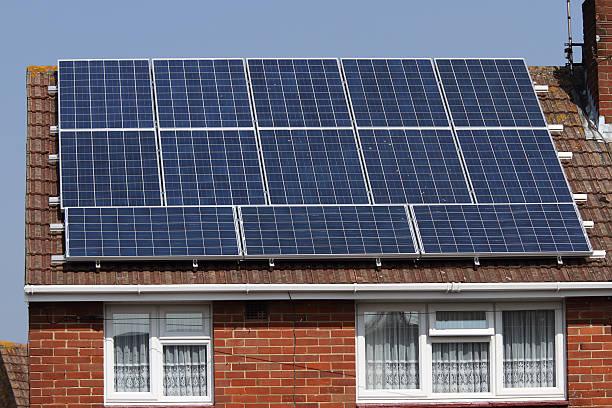 istock Solar panels on house roof 177091417