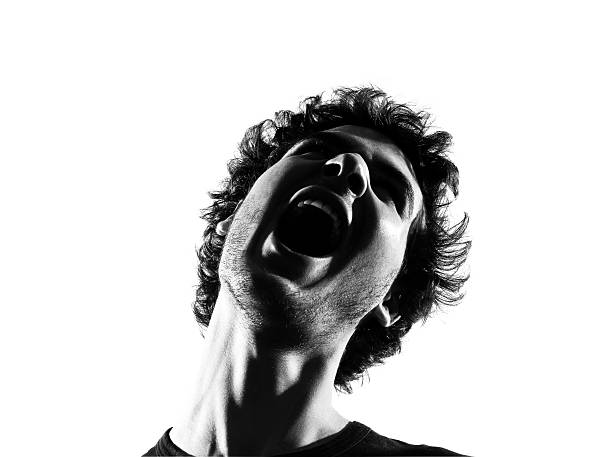 istock young man silhouette screaming angry portrait 177091829