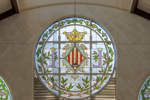 architectural detail of the Central Market in Valencia with the coat of arms of the city; Valencia, Spain