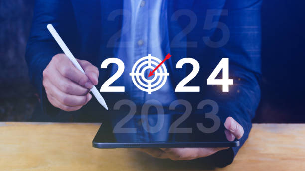 istock 2024 new year goal plan action, Business plan and strategies, Annual plan and development for achieving golas, Goal achievement and success in 2024, Businessman touch 2024 business target icon. 1770919938