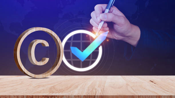istock Copyright concept, author rights and patented intellectual property, Copyright Symbol Protection Sign on wooden table. Register Trademark and Logo 1770920508