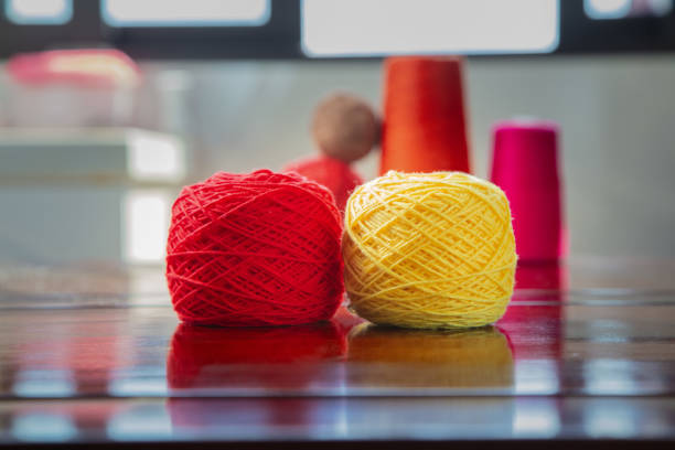 Woolen yarn and fabric on the window sill
