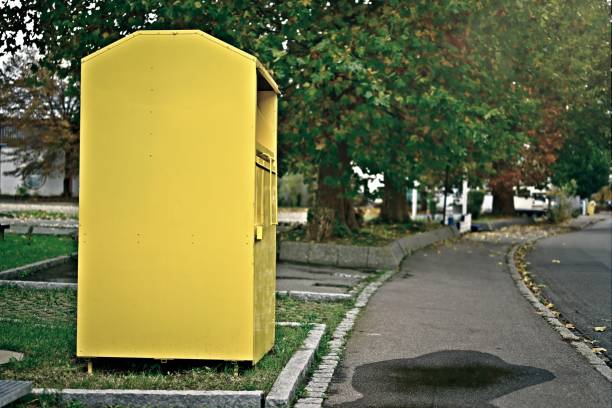 istock Yellow Clothes collection box. Container to deposit used clothes. 1770931971