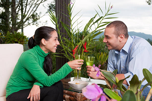 Couple Toasting at country house stock photo