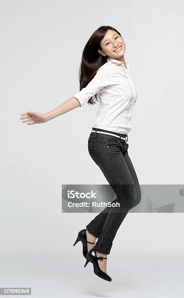 Jump For Joy Stock Photo - Download Image Now - Businesswoman, Jumping, Women