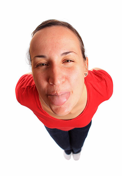 istock Young woman sticking her tongue out 177096032