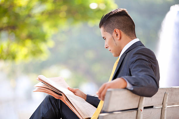 istock Businessman reading the newspaper 177096233