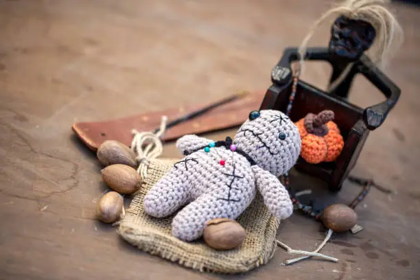 Voodoo Doll on a wooden background
