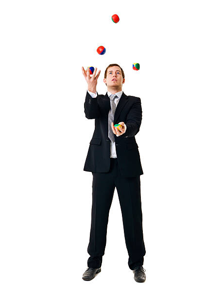 fare il giocoliere uomo - juggling efficiency skill businessman foto e immagini stock