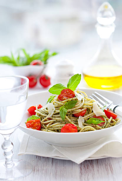 istock spaghetti with  pesto and tomato 177097970