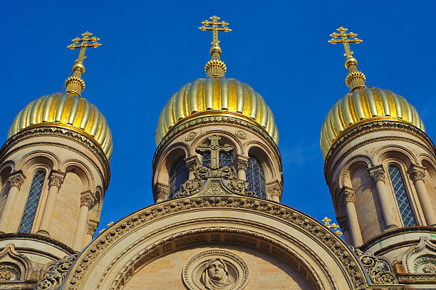 The Russian Orthodox Church in Wiesbaden/Germany The golden domes of the Russian Orthodox Church in Wiesbaden/Germany in front of a blue sky. church hessen religion wiesbaden stock pictures, royalty-free photos & images