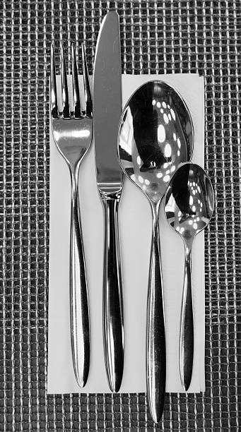 istock Fork, knife, spoons and napkin on restaurant table 177098881