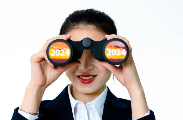 istock Businesswoman using binoculars to look at 2024 1770999230